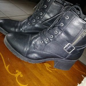 Never worn combat looking boots. Comes with box